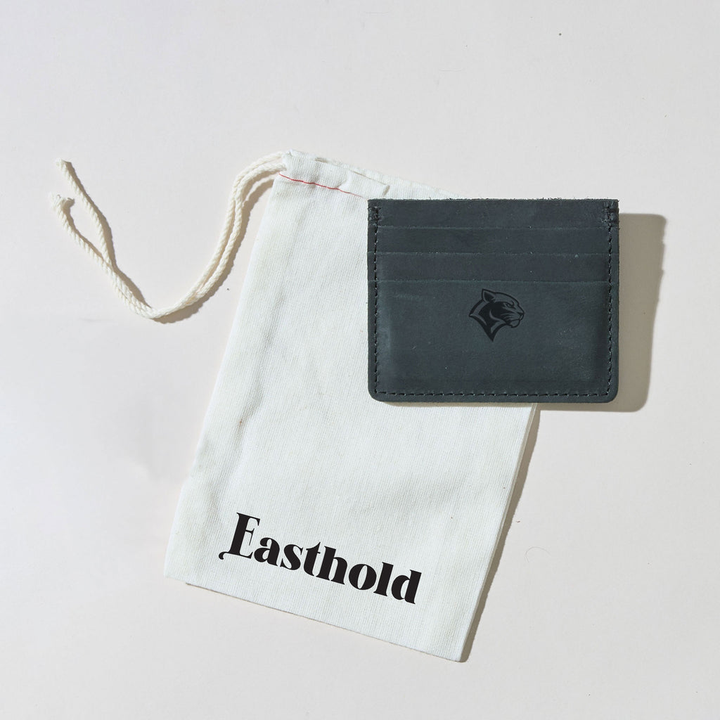 Black leather cardholder with a custom logo engraving