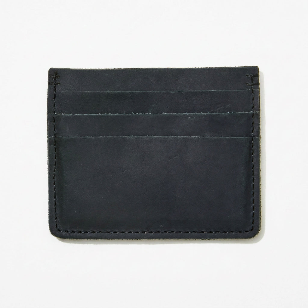 Black leather cardholder on a white background